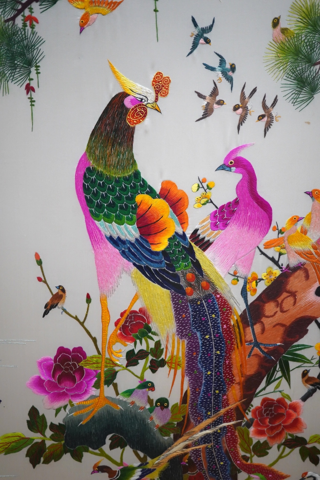 A modern Chinese embroidery on silk depicting birds of paradise, signed with character marks, 120 x 67cm. Condition - good